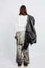 MID-RISED SKIRT WITH OPEN-LEG PANELS IN SELVEDGE DENIM