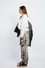 MID-RISED SKIRT WITH OPEN-LEG PANELS IN SELVEDGE DENIM