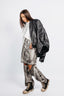 MID-RISED SKIRT WITH OPEN-LEG PANELS IN SELVEDGE DENIM