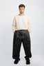 PLEATED WIDE-LEG PANTS IN SELVEDGE DENIM