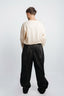 PLEATED WIDE-LEG PANTS IN SELVEDGE DENIM